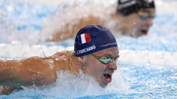 Léon Marchand gana el oro en 200 metros mariposa y bate el récord olímpico