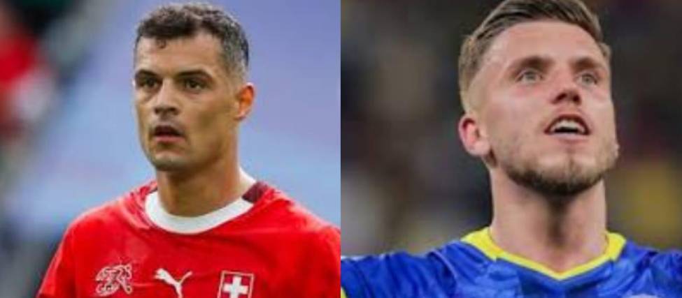 El suizo Xhaka (izq.) y el bosnio Demirovic.
